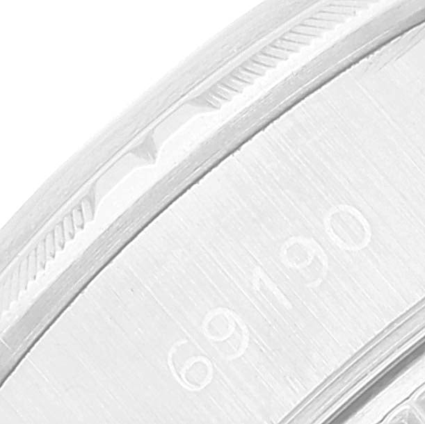 Rolex Date White Dial Engine Turned Bezel Steel Ladies Watch 69190