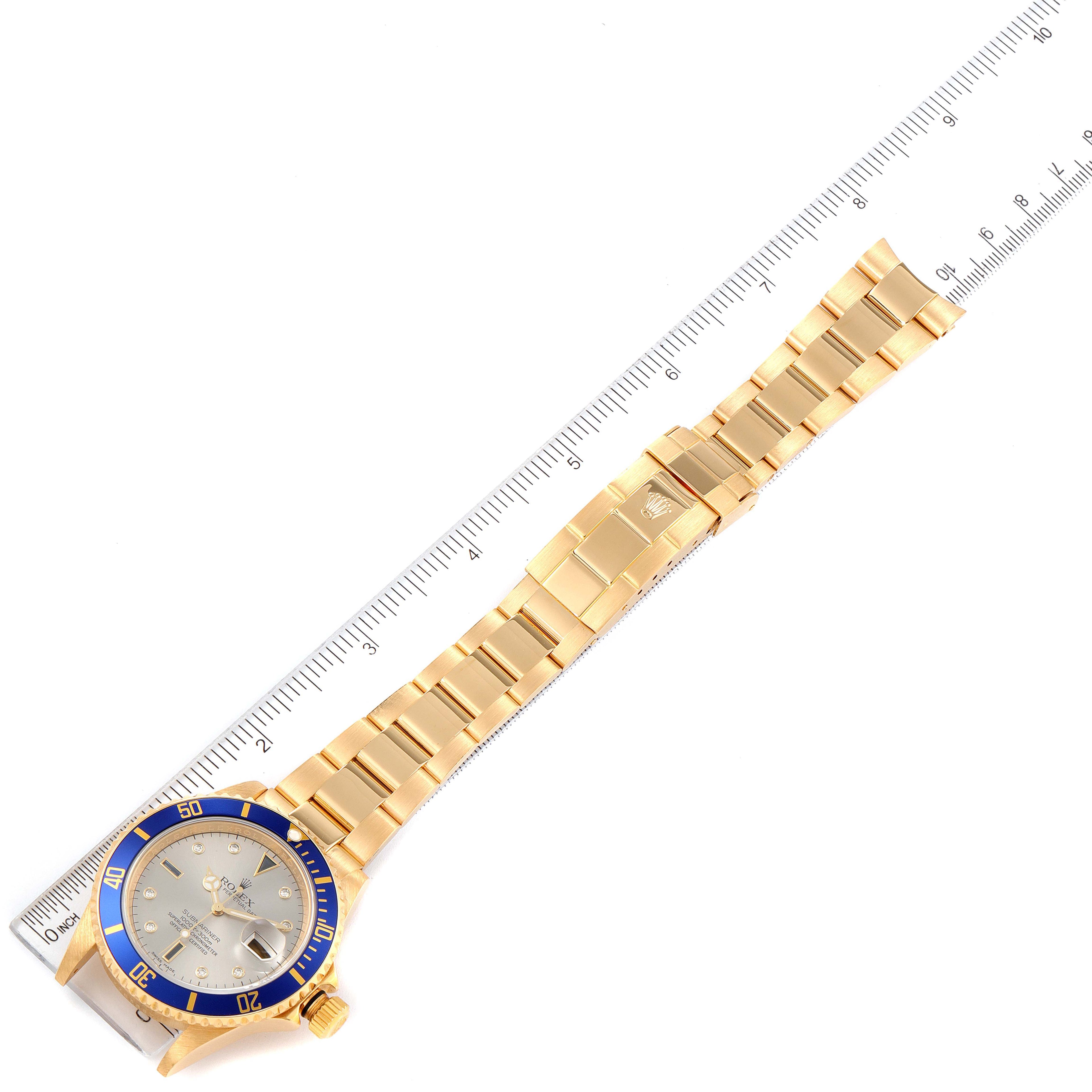 Rolex Submariner Yellow Gold Diamond Sapphire Serti Dial Watch 16618